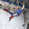 Trapeze student holding a front balance position