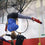 Aerial hoop student in a straddle position