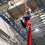 Aerial silks student prepares to perform a drop on silks